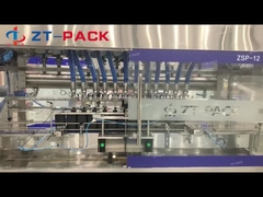 Máquina de rellenar de alta velocidad Tra del metro de flujo 4000BPH del aceite de motor de gasolina del líquido de frenos de la grasa del aceite lubricante